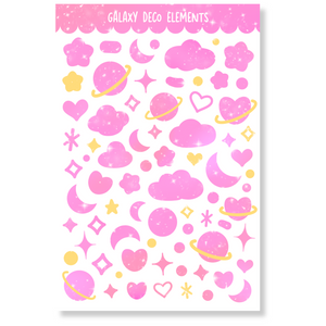 Galaxy Deco Elements Sticker Sheet featuring glossy pink celestial designs, perfect for planners and phone cases, 4" x 6".